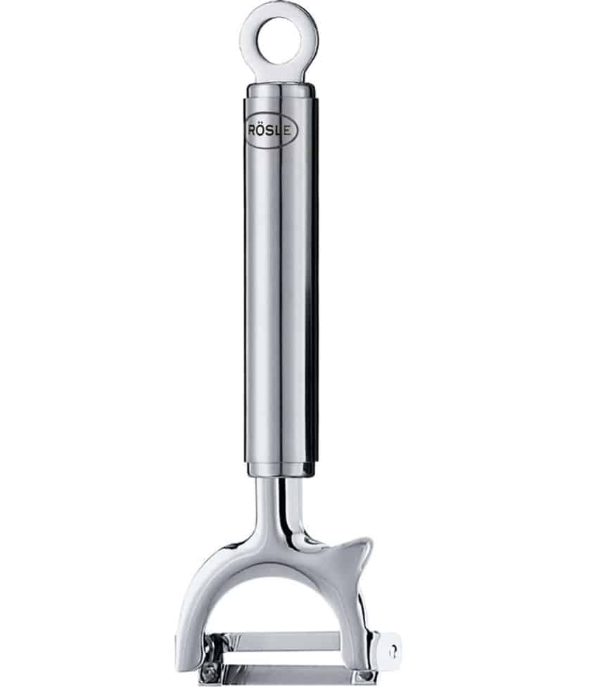 This stainless steel vegetable peeler features a cylindrical handle and a loop for easy hanging. Its horizontal blade offers an ergonomic design for efficient peeling, making it perfect for preparing ingredients in your favorite baked apple fritter recipe.